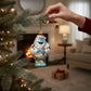 Mellow Monkey Bumble the Abominable Snow Monster Christmas ornament, 4.5-in blown glass, holding candy cane, wrapped in lights.