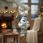 Mellow Monkey Bumble the Abominable Snow Monster holiday ornament, blown glass, 4.5-in, with candy cane and Christmas lights.
