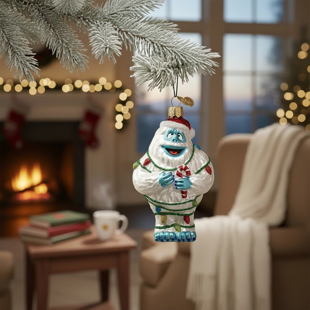 Mellow Monkey Bumble the Abominable Snow Monster holiday ornament, blown glass, 4.5-in, with candy cane and Christmas lights.