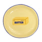 Mellow Monkey round ceramic trinket tray in butter yellow with a blue rim and a butter stick graphic