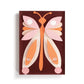 Mellow Monkey Together Tile Acrylic Wall Art, 5x7-in, featuring a colorful butterfly design with pink, orange, and cream layered paper cutouts on a dark brown textured background.