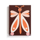 Mellow Monkey Together Tile Acrylic Wall Art, 5 x 7-in, featuring a stylized butterfly in orange, pink, and white on a brown background.