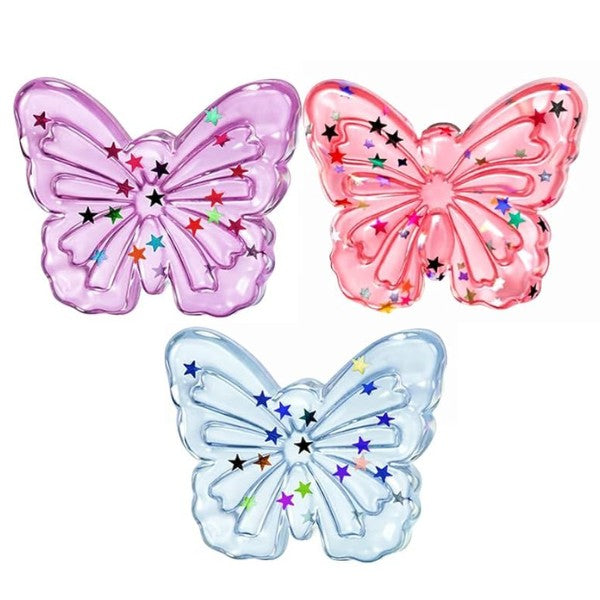 Mellow Monkey butterfly-shaped jelly squishies in purple, pink, and blue with glittery star confetti inside.