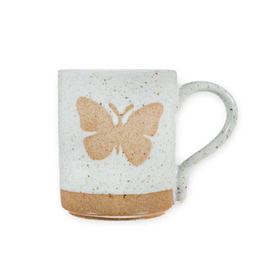 Mellow Monkey speckled stoneware mug featuring a hand-carved butterfly design and Follow Your Bliss quote inside.
