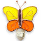 Mellow Monkey stained glass butterfly nightlight with yellow and orange wings and a copper electroplate finish.