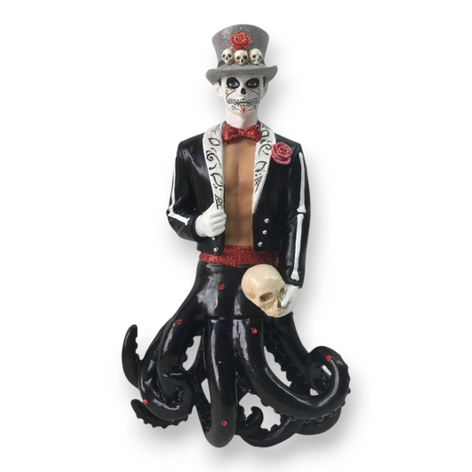 Mellow Monkey December Diamonds Calavera merman ornament featuring a skeleton face, top hat, and black octopus tail.