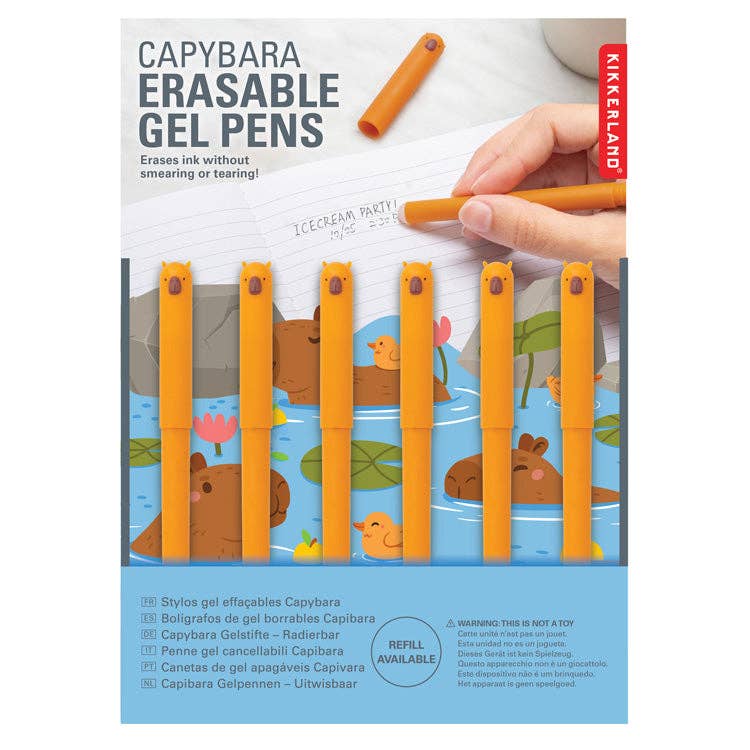 Mellow Monkey set of six orange capybara-themed erasable gel pens with cute animal toppers on display in packaging