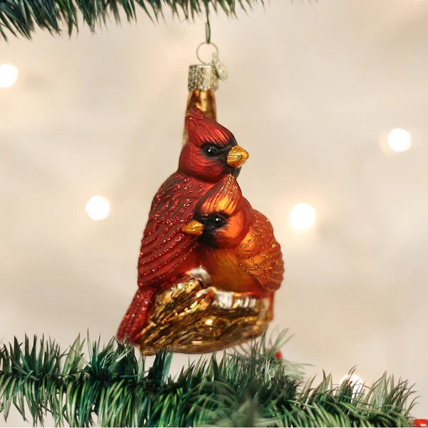 Mellow Monkey Pair of Cardinals Old World Christmas blown glass ornament, 4.5-in. Red and orange birds on a gold nest.