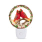 Mellow Monkey resin cardinal night light featuring two red birds in a festive holly wreath with soft LED glow