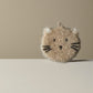 Mellow Monkey Moki cat dish scrubber, taupe with black embroidered features and white ear accents. Scrubby texture.