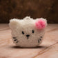 Mellow Monkey Pearl cat dish scrubber, white with pink bow, scrubby and soft sides for cleaning.