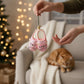 Mellow Monkey pink blown glass cat lady slippers holiday ornament with glitter detail and cat faces.