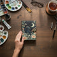 Mellow Monkey Cat and Moon vintage leather spellbook with 200 pages and a black cat illustration.