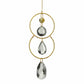 Mellow Monkey celestial suncatcher with gold rings, metallic chains, and clear faceted crystals for window decor.