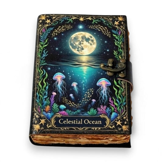 Mellow Monkey Celestial Ocean handmade leather journal with moonlit ocean scene, jellyfish, and ornate clasp. 5x7 inches.