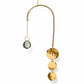 Mellow Monkey celestial suncatcher with a bronze wire frame, gold chain, faceted crystal, and hanging metallic discs.