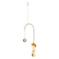 Mellow Monkey celestial pendulum suncatcher with a bronze wire frame, gold chain, and hanging crystal prism.
