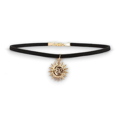Mellow Monkey black velvet choker with a gold sun and moon celestial pendant for a chic, adjustable fit.