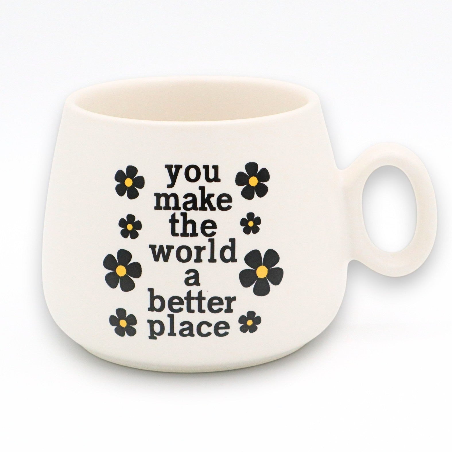 Mellow Monkey ceramic cappuccino mug in white with black floral accents and You Make The World A Better Place text