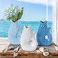 Mellow Monkey small ceramic fish vase in serene white, seafoam, and blue. Perfect for flowers.