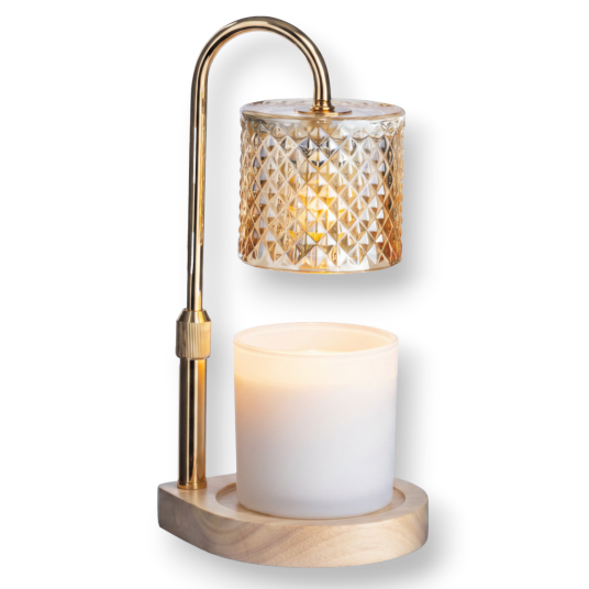 Mellow Monkey champagne crystal candle warmer lamp with a gold stem and faceted glass shade over a jar candle.