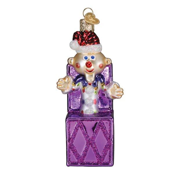 Mellow Monkey Charlie-In-The-Box glass ornament with red Santa hat and purple box. 4.5-in.