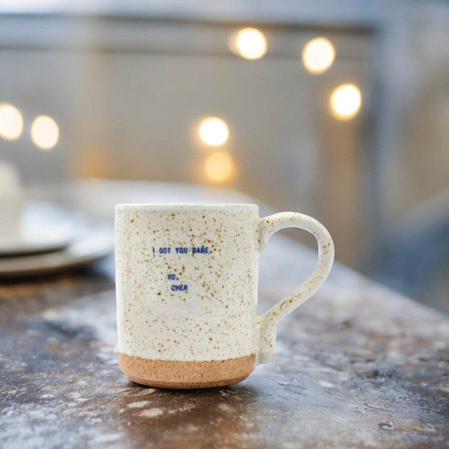Mellow Monkey handmade speckled ceramic mug featuring the quote I Got You Babe XO Cher in blue text