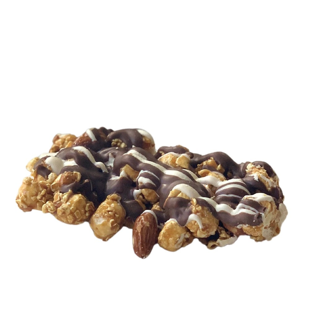 Mellow Monkey gourmet caramel popcorn drizzled with milk and white chocolate and topped with whole California almonds.