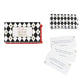Mellow Monkey Christmas movie trivia game in a black and white diamond pattern sleigh box with 80 question cards.