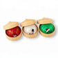 Mellow Monkey Christmas mystery squishy dumplings featuring red reindeer, white snowman, and green holiday characters.