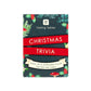 Mellow Monkey Midnight Forest Christmas trivia card game box with festive holly and mushroom illustrations.