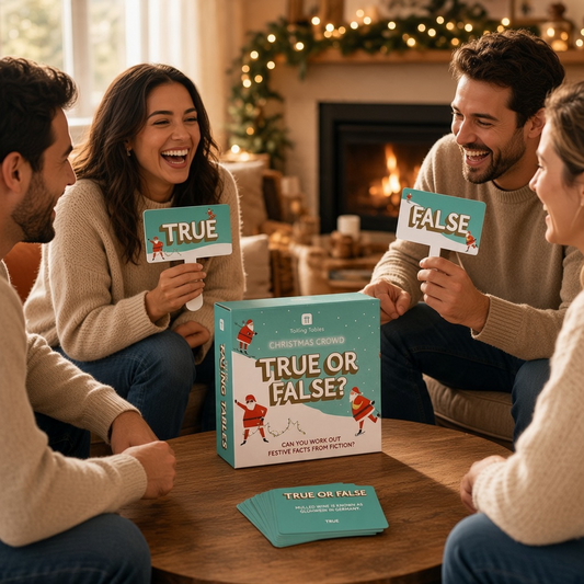 Mellow Monkey Christmas True or False trivia game with paddles and cards being played by a happy group of friends.