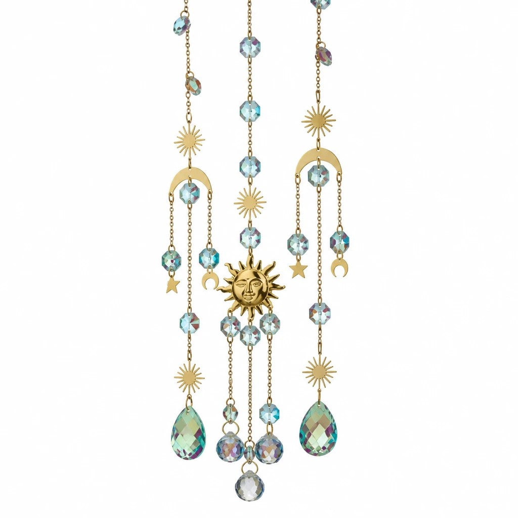Mellow Monkey Circle of Life suncatcher with gold sun, moon, and star charms, crystals, and iridescent beads.