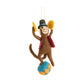 Mellow Monkey handcrafted wool and foam circus monkey ornament balancing on a blue and orange ball