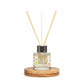 Mellow Monkey Fresh Citrus reed diffuser in a glass bottle with wooden base, designed to neutralize pet odors.