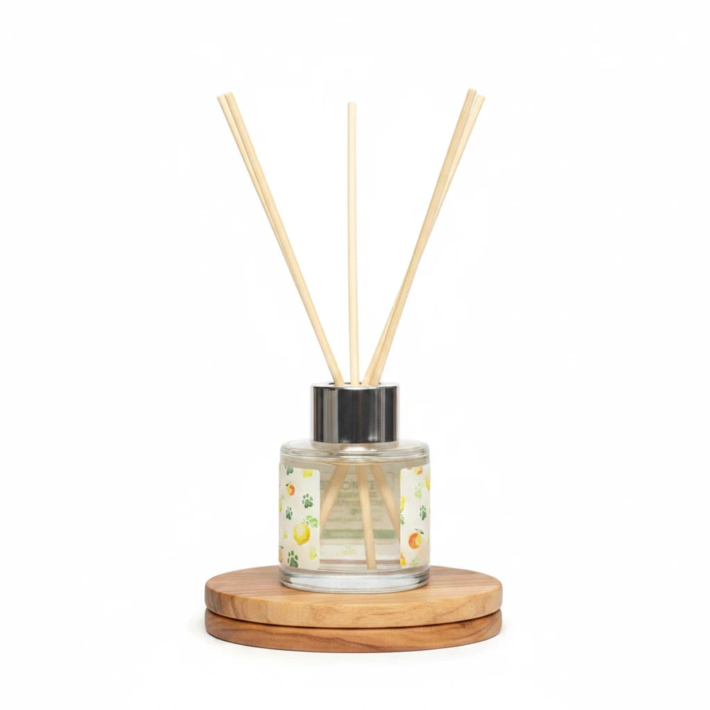 Mellow Monkey Fresh Citrus reed diffuser in a glass bottle with wooden base, designed to neutralize pet odors.