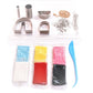 Mellow Monkey clay jewelry kit with six colors of polymer clay, metal earring cutters, necklace chain, and tools.
