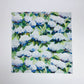Mellow Monkey cotton dinner napkin featuring a blue and green coastal hydrangea floral print by Kim Hovell.