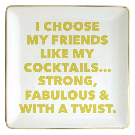Mellow Monkey white ceramic trinket tray with gold trim and yellow text quote: "I Choose My Friends Like My Cocktails... Strong, Fabulous & With a Twist."