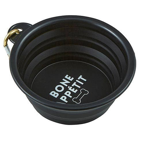 Mellow Monkey black collapsible silicone pet bowl with "Bone Appetit" text and bone graphic, includes carabiner.