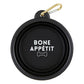 Mellow Monkey black collapsible silicone pet bowl with "Bone Appetit" text and bone graphic, includes carabiner.
