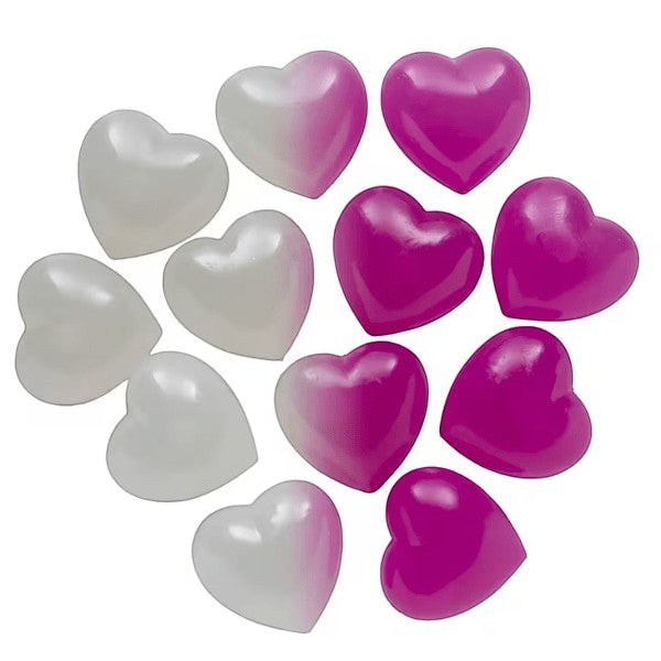 Mellow Monkey color-changing heart squishies in white and vibrant pink, soft sensory fidget toys for stress relief.
