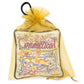 Mellow Monkey Connecticut mini pillow ornament featuring hand-embroidered state landmarks inside a gold organza bag.