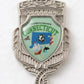 Mellow Monkey Connecticut jumbo souvenir spoon featuring a detailed state emblem with a shield, crown, and laurel.