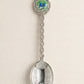 Mellow Monkey Connecticut jumbo souvenir spoon in polished silver tone with a braided handle and floral bowl engraving