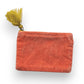Mellow Monkey coral quilted cotton velvet zip pouch with yellow tassel detail, 4"L x 6"H.