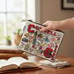 Mellow Monkey Cornell University woven zip pouch featuring colorful campus illustrations on durable polyester fabric.