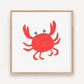 Mellow Monkey red crab art print in a light wood frame with plexiglass. Features original artwork by Kim Dettmer.
