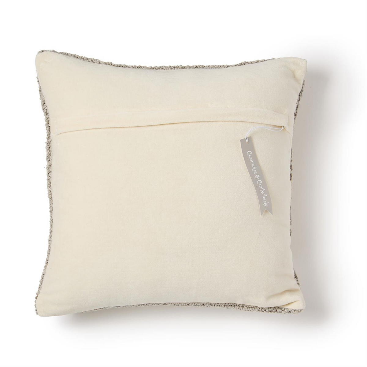 Mellow Monkey square decorative pillow back view in cream fabric with gray embroidered edges and brand tag