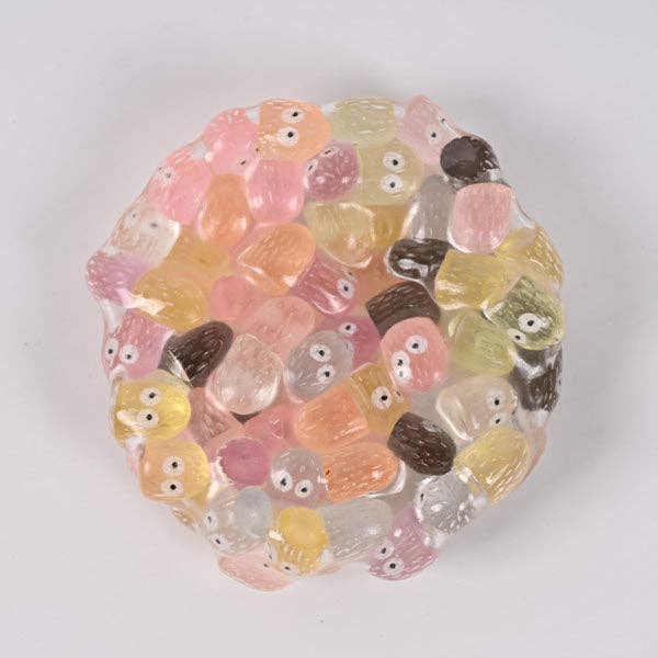 Mellow Monkey Crunch & Squish candy-themed stress ball with translucent, colorful, crunchy sensory fidget beads.